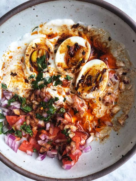 Perfectly poached eggs with a silky yolk over tangy yogurt with onions, tomatoes, and drizzled with a cumin chili oil and cilantro. Chili Oil Recipe, Chili Oil, Savory Breakfast, Poached Eggs, Egg Recipes, Recipes Food, Food Recipe, Traditional Food, Veggie Recipes