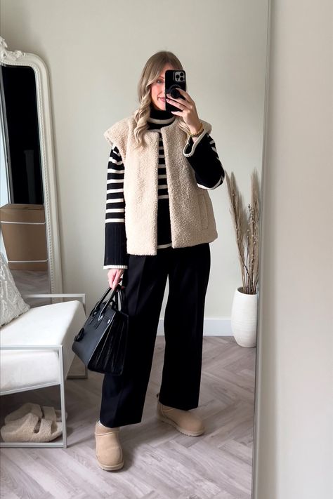 Sunday roast comfy casual outfit river island shearling gilet is sold out, I’ve linked some similar ones below. Toteme stripe jumper size s (save £40 at Farfetch using code CBSAVE) Reona trousers size xs Ugg ultra mini in sand Ysl sac de jour (Uk size 8 bottoms 10 top) #uggboots #shearling #stripes #casual #casualoutfit #comfy Follow my shop @charlottebuttrick on the @shop.LTK app to shop this post and get my exclusive app-only content! #liketkit #LTKstyletip #LTKeurope #LTKSeasonal @s Sherpa Gilet Outfit, Sheepskin Gilet Outfit, Ultra Mini Uggs Sand, Cream Gilet Outfit Women, Sunday Roast Outfit, Fluffy Gilet Outfit, Cream Gillet Outfit, Ugg Ultra Mini Sand Outfit, Shearling Gilet Outfit