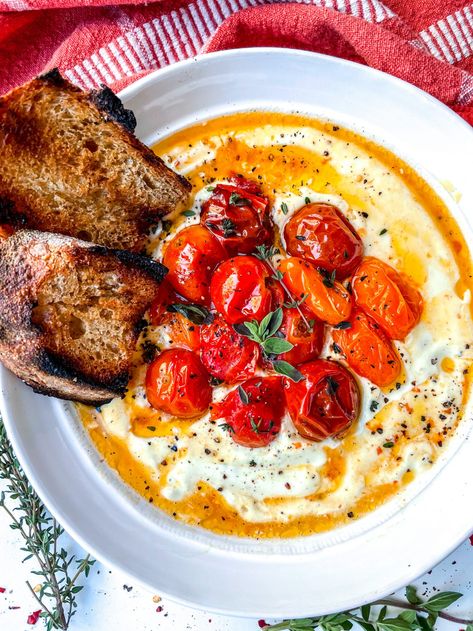 Whipped Feta Dip with Roasted Tomatoes Recipe - Everything Delish Feta Tomato Dip, Everything Delish, Roasted Tomatoes Recipe, Feta Tomato, Whipped Feta Dip, Toasted Baguette, Oven Roasted Tomatoes, Tomatoes Recipe, Grilled Bread