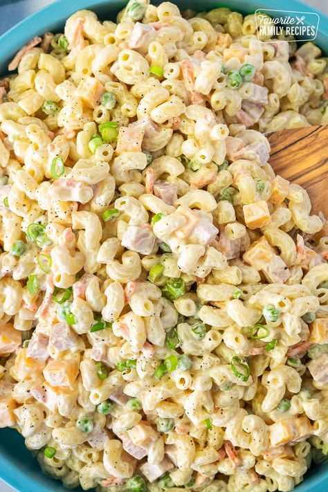 This is the perfect Traditional Macaroni Salad. It's loaded with ham, cheese, and veggies, in a creamy dressing. Perfect for BBQs and Potlucks! #macaronisalad #pastasaladrecipe #macsalad #macaronisaladrecipe #pastasalad #creamydressing #potluckrecipe #bbqrecipe #bbqsalad #summersalad Ham And Cheese Salad Recipe, Loaded Macaroni Salad, Macaroni Ham Salad Recipe, Ham Pasta Salad Recipes Cold, Macaroni And Ham Salad, Traditional Macaroni Salad Recipe, Ham And Cheese Macaroni Salad, Traditional Macaroni Salad, Dressing For Macaroni Salad