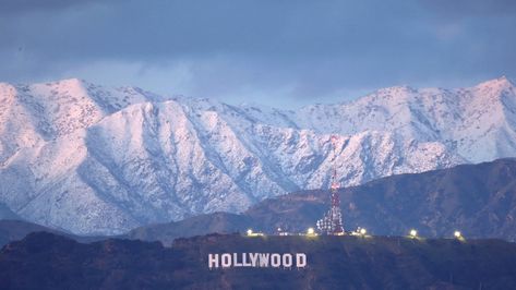 The Hollywood sign stands in front of snow-covered mountains after another winter storm hit Southern California on March 01, 2023 in Los Angeles, California. Mario Tama/Getty ImagesMuch of the state is under weather warnings after unseasonable snow and rain, with several evacuations issued. The post Powerful atmospheric river pummels California with even more rain and flooding appeared first on Popular Science. San Bernardino Mountains, California Drought, Snow Capped Mountains, Shasta Lake, California Wildfires, River Basin, Mammoth Lakes, Hollywood Sign, Winter Storm