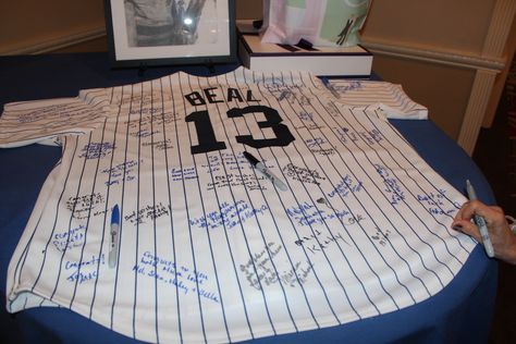 We didn't have a guest book to sign, we had a Baseball Jersey, with the wedding day as the jersey number and the wedding couples name Baseball Jerseys, Wedding Guest Book, Gold Wedding, Wedding Themes, Guest Book, Wedding Couples, Bridal Shower, Dream Wedding, Wedding Day