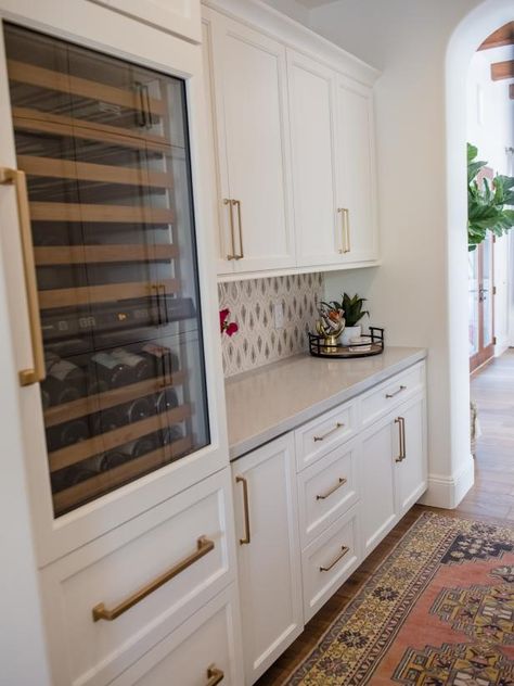 How to Style a Modern Butler’s Pantry | Butler’s Pantry Ideas | HGTV Butlers Pantry Long And Narrow, Butlers Pantry Wine Fridge, Fancy Laundry Room Ideas, L Shaped Butlers Pantry, Butlers Pantry Ideas Layout With Sink, Butlers Pantry With Window, Butlers Pantry Bar, Butler Room, Butler Pantry Decor