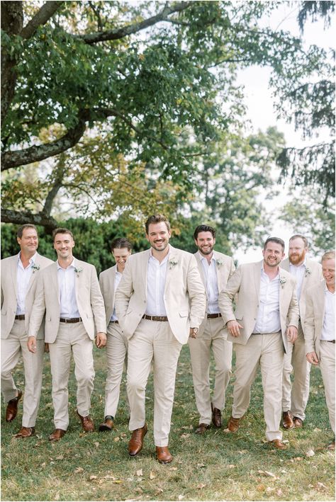 Relaxed, classic groomsmen attire for a summer wedding. Beige suites and white shirts with brown shoes-the perfect combination! Wedding Inspiration for the groom. #groomsuit #beigesuit #groomstyle #groomsmensuits Pale Yellow Groomsmen Attire, Light Khaki Groomsmen Attire, Groom In Khaki Pants, Groomsmen Attire Light Brown, Groomsmen Attire Cream Suits, Oatmeal Suit Wedding, Light Beige Groomsmen Suits, Groomsmen Suits Beige, Summer Groom Attire Outdoor Weddings