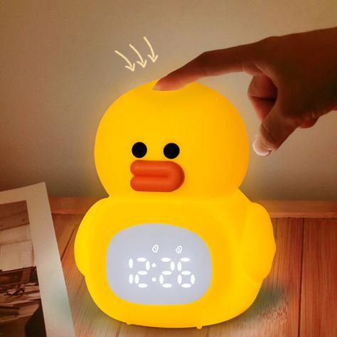 Little Duck Lamp is a versatile and charming addition to any room. This dual-functioning product serves as both a clock and lamp, providing both practicality and style. With its cute duck design, it adds a playful touch to any space. Perfect for children's rooms or as a unique accent piece. What does it mean to set of 2?It simply means that there are two lights, each with the separate quantity indicated, in the order & packaged together. Please Note: The dimensions of this lamp are very small, only about the size of a palm. Purchase Notes: Only supports shipping to Japan, Australia, the EU, and the United States, other countries do not support shipping. PRODUCT NOTES L 12.5cm x W 13.3cm x H 15cm / L 4.9″ x W 5.2″ x H 5.9″. (39.4" charging cable) Yellow. SKU: ZD-A-8870 MATERIALS Lamp body: Yellow Room Ideas Bedrooms, Duck Room Decor, Yellow Room Ideas, Duck Furniture, Duck Things, Yellow Kids Rooms, Duck Lamp, Duck Stuff, Weird Furniture