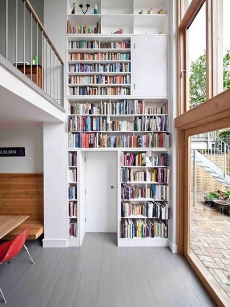 This two-story book unit is a marvel of built-in architecture that any book-lover would adore. On the other hand, getting to some of the books on the highest levels might be a little tricky. Home Library Design Ideas, Shelves Decoration, Lots Of Books, Library Wall, Home Library Design, Design Library, Attic Rooms, Home Libraries, Book Shelves