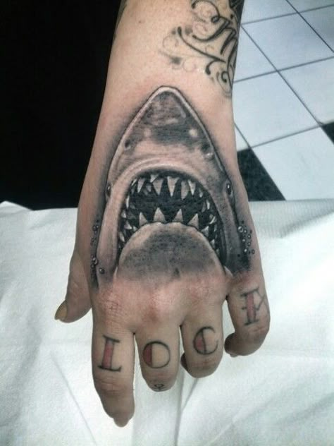 #shark #tattoo #black #grey #jaws Jaws Shark Tattoo, Jaws Tattoo Movie, Jaws Tattoo Ideas, Megladon Shark Tattoo, Jaws Movie Tattoo, Tigershark Tattoo, Shark Hand Tattoo, Shark Head Tattoo, Jaws Tattoo