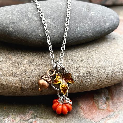 Pumpkin Fall Handmade Necklace - Fall Lover Jewelry This fall lovers necklace is a great addition to your fall wardrobe!  It comes with all charms as shown, and the pumpkin charm has been dipped in a clear coating for extra protection while wearing.   Available in many chain lengths. INSTRUCTIONS for additional questions:  1.  Email photos to touchofwhimsybyjen@yahoo.com 2.  Private msg on Facebook page at https://www.facebook.com/touchofwhimsybyjen/ 3.  Send through message on Etsy messenger ** Halloween Jewelry Diy, Pumpkin Jewelry, Fall Lovers, Pumpkin Necklace, Goth Clothes, Fall Rings, Lover Jewelry, Autumn Necklace, Beads Craft Jewelry