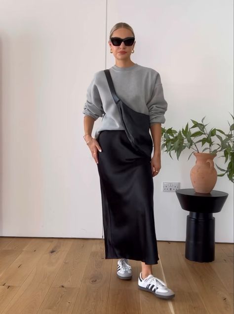 Slip Skirt With Sneakers, Black Satin Skirt Outfit Plus Size, Style Black Satin Skirt, Black Skirt Outfit Classy, Black Denim Skirt Outfit Casual, Black Midi Skirt Outfit Casual, Black Satin Skirt Outfit Classy, Black Linen Skirt Outfit, Long Skirt With Sweater Outfit