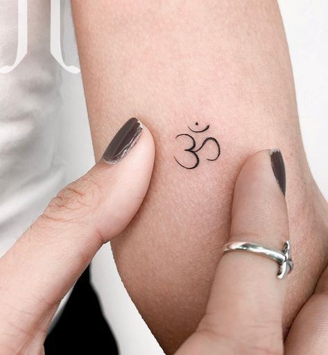 Fine Line Om Tattoo, Yoga Fine Line Tattoo, Aum Tatoos Small, Om Tattoo Design Women, Ohm Tattoo Design, Om Tattoo Small, Ohm Symbol Tattoo, Acceptance Tattoo, Yoga Tattoos For Women