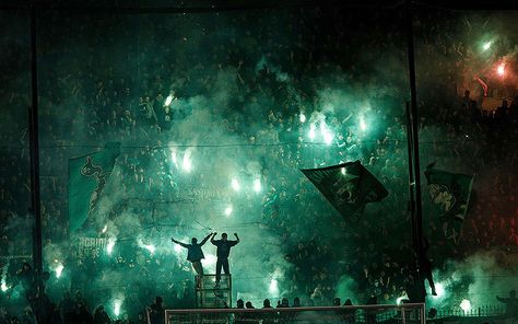 Panathinaikos' fans light flares after the cancellation of the Greek Super League match between Panathinaikos and Olympiakos at Apostolos Nikolaides stadium in Athens Snow In China, Lazy Frog, Athletic Wallpaper, Basketball Themed Birthday Party, Basketball Cupcakes, Ultra Casual, Ultras Football, Paris Poster, Super League