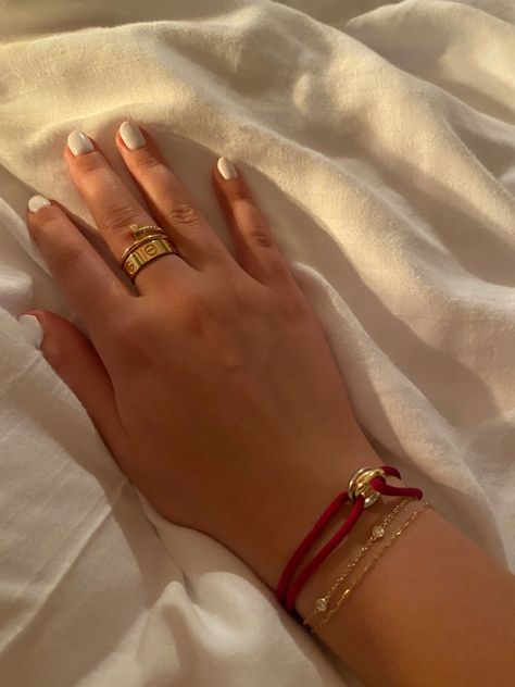 Cartier Bracelet And Ring, Cartier Thread Bracelet, Cartier Trinity Bracelet Stack, Cartier And Tiffany Bracelet Stack, Cartier Love Ring Aesthetic, Cartier Trinity Bracelet Cord Colors, Cartier Love Bracelet Aesthetic, Cartier Love Bracelet Stack, Cartier Ring Aesthetic