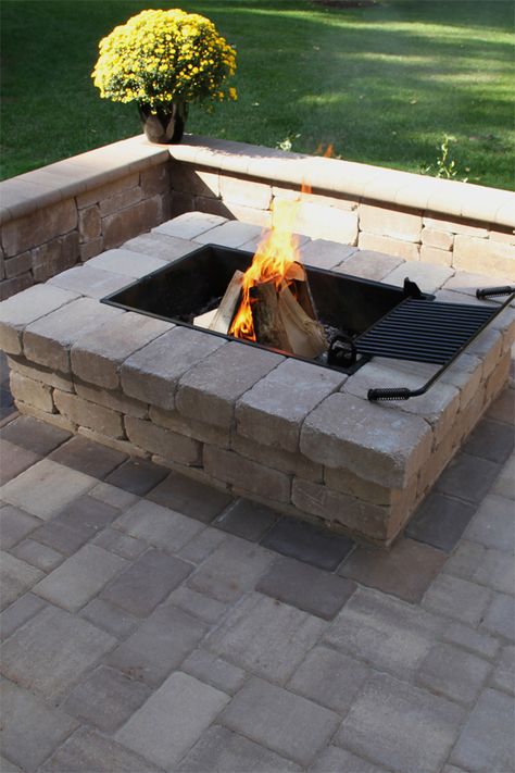 The Yorkshire™ Fire Pit comes in a tumbled finish, giving it a rustic look that matches up to most of NewLine Hardscapes' wall products. The size of this fire pit makes it an ideal place to sit around with family and friends. The Yorkshire Fire Pit is available in both a rectangle and square unit, and can be used either for wood-burning fires or fitted for natural gas. Landscaping Ideas For Backyard, Hardscape Ideas, Ideas For Backyard, Fire Pit Materials, Fire Pit Ideas, Fire Pit Landscaping, Fire Pit Kit, Rectangular Fire Pit, Cool Fire Pits