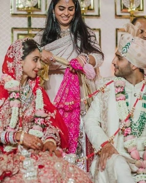 Note: For all our readers confused about the wedding dates, Isha Ambani had tied the knot on 12th December, 2018 while Akash tied the knot on 9th March, 2019. Please check our article for more details☺️: https://www.bollywoodshaadis.com/articles/wedding-album-f-the-ambani-family-54209 Anant and Radhika’s grand wedding has become a beautiful addition to the Ambani wedding frame!😍🤩 #nitaambani #mukeshambani #anantambani #radhikamerchant #shlokaambani #shlokamehta #shlokamehtaambani #akasham... Ambani Wedding, Isha Ambani, Nita Ambani, Wedding Dates, Grand Wedding, Handmade Fabric Bags, Wedding Frame, The Wedding Date, Indian Wedding Dress