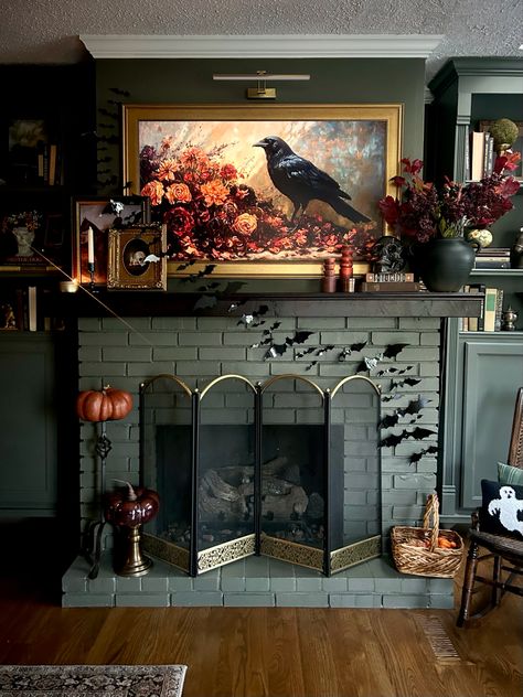 Spooky, moody, collected, and curated living room mantle design for Halloween and October! Cauldron In Fireplace, Moody Fireplace Decor, Moody Mantle Decor, Moody Fireplace, Spooky Living Room, Mantle Decorating Ideas, Mantle Design, Living Room Mantle, Spooky Spooky