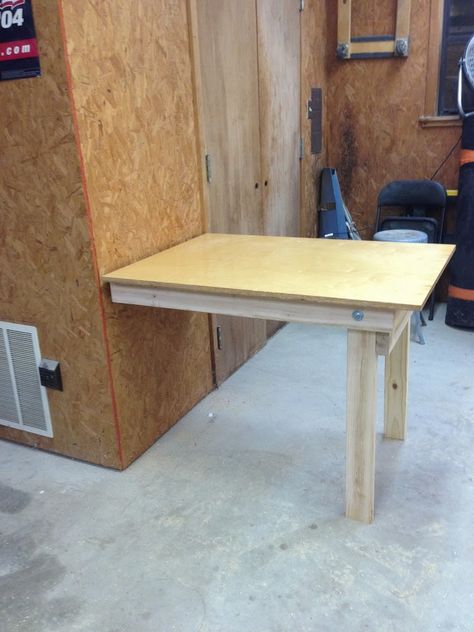 Ahhh! My shop is on it’s way to becoming functional! I still have plenty of projects to go, but at least one more is off the list. Take a look and let me know what you think of my fold down w… Woodworking Space, Diy Workbench Plans, Work Garage, Workbench Table, Building A Workbench, Folding Workbench, Fold Down Table, Drop Down Table, Diy Workbench