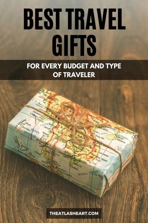 A small package wrapped in a map as wrapping paper and brown string, with the text overlay, "Best Travel Gifts." Travel Agency Gift Ideas, Diy Gift For Traveler, Travel Gift For Boyfriend, Presents For Travelers, Traveling Gift Ideas, Travel Gift Box Ideas, Travel Gift Ideas For Him, Gift For Traveling Friend, Traveler Gift Ideas