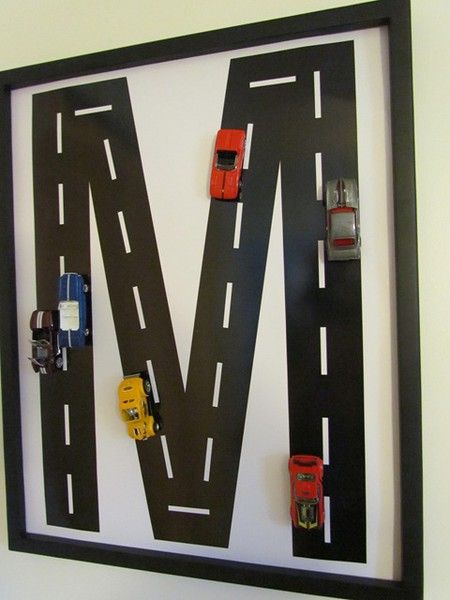 Decorating boy rooms  I would either just paint a board or cover with fabric and then applique the roads on so they can take it down and play anytime they want. Compleanno A Tema Hot Wheels, برق بنزين, Monogram Wall Art, The Letter M, Cars Room, Camera Car, Car Bedroom, Letter Wall Art, Simple Wall Art