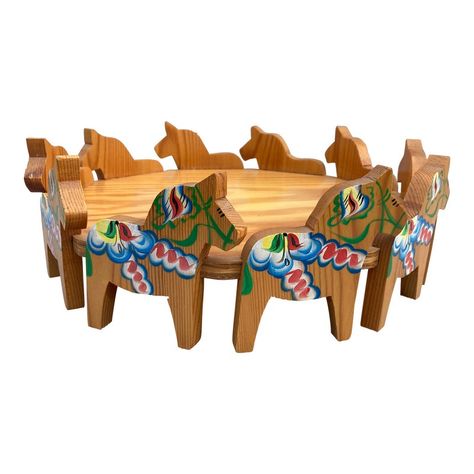 Vintage 60's Scandinavian wood Dala Horse cake stand, serving tray.  Round tray has 10 hand carved and colorful painted horses around the perimeter.  Great condition.  It measures 11 3/4" by 11 3/4" by 3 3/4".  The round platform base measures 10 1/4" in diameter by itself. Folk Furniture, Scandinavian Wood, Christmas Wreath Craft, Painted Horses, Horse Cake, Dala Horse, Scandinavian Folk Art, Horse Drawings, Round Tray