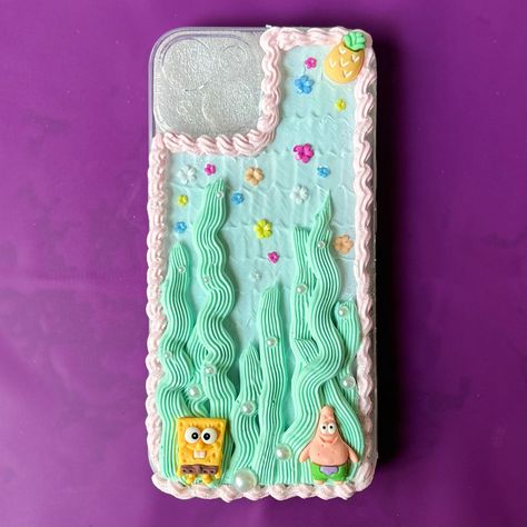 Phone case made with cream glue and resin charms, imitation pearls, and iridescent glitter Diy Spongebob, Cream Glue, Case Ideas, Resin Charms, Cute Phone Cases, Glue, Phone Case, Charms, Glitter