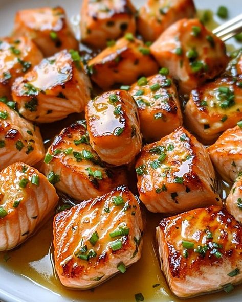 Honey Butter Garlic Glazed Salmon Bites - Recipessin Honey Butter Glazed Salmon Bites, Baked Salmon Appetizer, Sweet Salmon Glaze, Honey Butter Garlic Glazed Salmon Bites, Salmon Hors D’oeuvres, Salmon Ideas For Dinner, Salmon Bits, Salmon Tapas, Blackened Salmon Bites