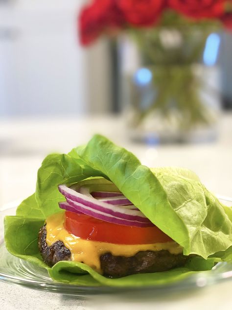 If you know me, you know I LOVE cheeseburgers. This butter lettuce wrapped cheeseburger is to die for! I'm so excited about this! Kicking the bun for some butter lettuce, makes that classic, not-so-healthy cheeseburger, well...healthyish. And the best part, it couldn't be easier to make. Lettuce Burger, Healthy Cheeseburger, Lettuce Burgers, Lettuce Wrapped Burger, Beef Lettuce Wraps, Butter Lettuce, Grilled Burgers, The Bun, Organic Tomatoes