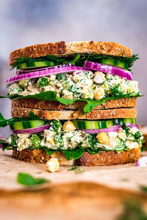 This Smashed Chickpea Salad features crisp veggies, tangy feta, briny capers and loads of fresh herbs, tossed with protein-packed chickpeas in a zingy lemon dressing. The perfect vegetarian lunch, dinner or cookout side dish. Made with just 8 simple ingredients and ready in 15 minutes! Smashed Chickpea Wrap, Smashed Chickpea Sandwich, Chickpea Sandwich Recipes, Chick Pea Salad Sandwich, Chickpea Lunch, Chickpea Salad With Feta, Smashed Chickpea Salad, Smashed Chickpea, Veggie Lunch