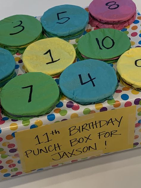 Easy to make punch board box @michellepaigeblogs.com Punch Hole Birthday Board, 18th Birthday Gifts With Money, 10 Days To Go Countdown Birthday Ideas, Punch Gift Ideas, How To Make A Punch Board With Cups, Turning 11 Birthday Ideas, 12th Birthday Boy Ideas, How To Make A Punch Board, 10 Year Birthday Ideas