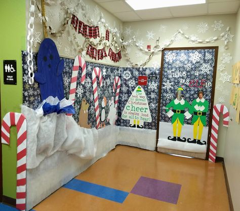 Decorated school door with Elf movie theme. Buddy The Elf Narwhal, Elf Desk Decorations, Elf Movie Classroom Door, Elf Themed Door Decorations, Movie Elf Decorations, Candy Cane Forest Decorations Elf, Elf Cubicle Christmas Decorations, Elf Christmas Office Decorations, Elf Movie Door Decorating Contest