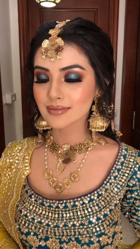 A colorful Mehndi look specifically concentrating on hooded eye makeup look. [Video] | Indian bride makeup, Latest bridal makeup, Bridal makeup images Bridal Makeup Ideas Indian, Non Bridal Makeup Indian, Haldi Mehendi Makeup Look, Sangeet Bridal Makeup Look, Makeup By Parul Garg, Best Bridal Makeup Pakistani, Best Bridal Makeup Indian, Eye Makeup For Lehenga, Eye Makeup For Bride Indian