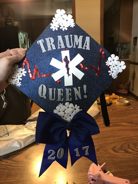 EMT Graduation Cap, Trauma Queen, Advanced EMT, AEMT, College graduation cap design  // follow us @motivation2study for daily inspiration Emt Party Decorations, Emt Cap Decoration, Ed Nurse Graduation Cap, Graduation Cap Designs Medical School, Ems Graduation Cap, Emt Party Ideas, Emt Graduation Caps, Emt Graduation Party Ideas, Paramedic Graduation Cap