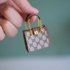 Inspiring Small Miniature Hand Bags Designs For Women's | Trending Designs | Hand Bags Ideas Miniature small clutch bags are tiny but stylish accessories designed to carry only the essentials. These compact bags come in a variety of materials and designs, from minimalist to complex. Often featuring a crossbody or wrist strap, we find comfort and a fashion statement for a light and modern look. in this video we will discussing about some of the best and great small miniature hand bags designs Barbie Purse, Hand Bags Ideas, Tiny Purses, Tiny Bags, Ken Barbie, Barbie Miniatures, Barbie Doll Set, Doll Bag, Tiny Bag