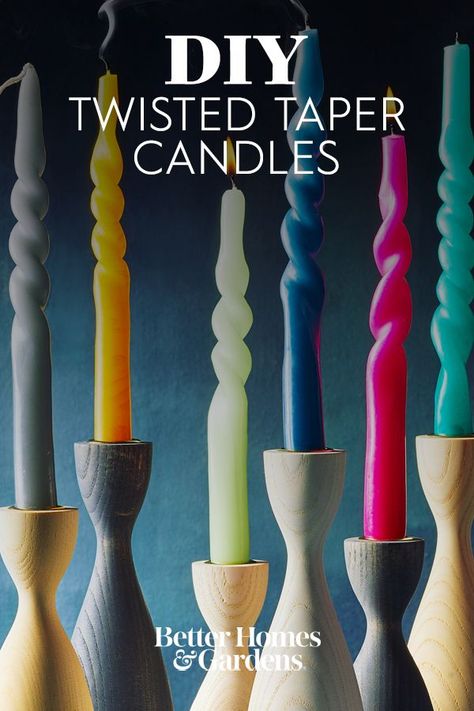 After a quick soak in hot water, it's easy to twist a plain taper candle into a sculptural piece of table decor. Create an inexpensive holiday centerpiece by grouping several candles together on a tray. Get creative when twisting and shaping your candles, the design options are endless. #twistedcandles #diytwistedcandles #diy #diyideas #bhg Diy Taper Candle Holders How To Make, Stick Candles Diy, Making Taper Candles, Christmas Tapered Candles, Taper Candle Making, Decorating With Taper Candles, Taper Candle Crafts, Diy Tapered Candles, Shaping Candles