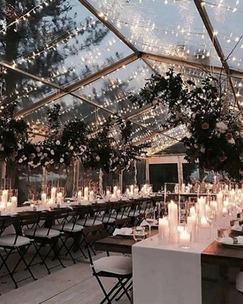 Enjoy the winter night sky under a swoon-worthy clear tented wedding reception. If you're planning a winter wedding you'll love this option of having a clear tent as you can see the sky but can still stay warm inside.  #winterwedding #weddingvenue #weddingideas #rusticwedding Kasut Pengantin, Candles And Flowers, Clear Tent, Rustic Wedding Decorations, Wedding Ceremony Ideas, Outdoor Wedding Reception, Ceremony Arch, Grace Loves Lace, Tent Wedding