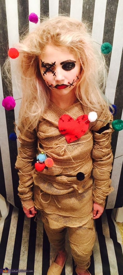 My daughter came up with the idea after last years halloween. She decided to be a voodoo doll. We used burlap, wooden dowels, Pom poms, hot glue gun, safety pins and twine to compete the look. We also used basic makeup; eyeliner, eyeshadow and lipstick. Photo 2 of 4. Diy Voodoo Doll Costume, Voodoo Doll Makeup, Voo Doo Doll, Diy Voodoo Dolls, Creepy Doll Costume, Voodoo Doll Costume, Voodoo Costume, Doll Makeup Halloween, 2017 Halloween Costumes