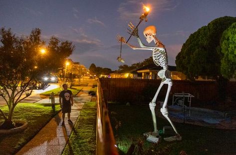 Big Skeleton Decoration, Giant Skeleton Halloween Decor, Giant Skeleton Ideas, Giant Skeleton, Dog Skeleton, Skeleton Decorations, Wrought Iron Fences, Iron Fence, Halloween Displays