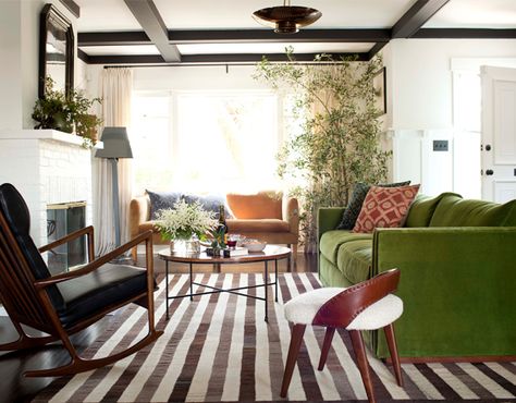 Add a pop of pigment that will complement your color scheme, like this room’s olive-hued couch. | Designer: Nickey Kehoe Nickey Kehoe, Beach Living Room, Craftsman Bungalow, Green Sofa, Craftsman Bungalows, Minimalist Living, Venice Beach, A Living Room, Home Interior