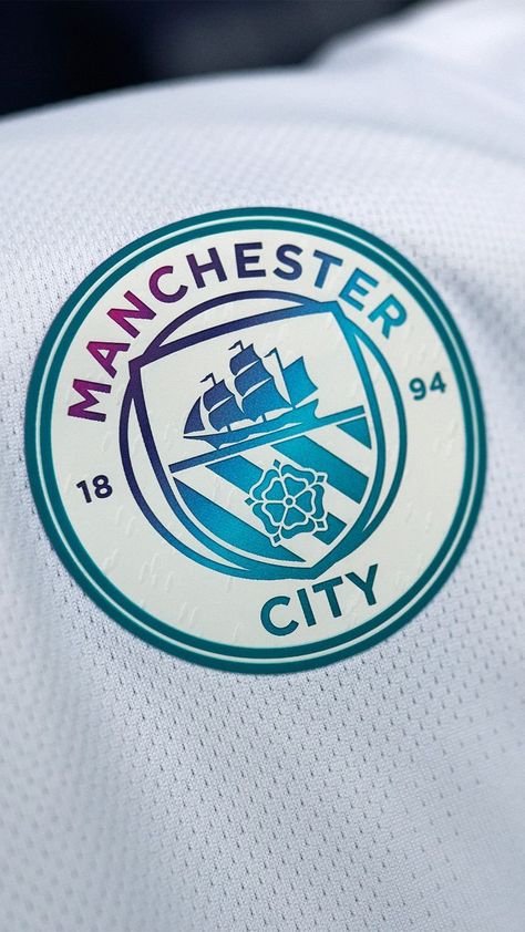 Made with impact-reducing Dope Dye, the new Manchester City Away shirt features all-over water graphics and iridescent accents, marking the launch of new clean water programs by the club’s charity initiative Cityzens Giving. PUMA will partner with Cityzens Giving and the club’s Official Water Technology Partner Xylem to deliver football and WASH education programs across the world and provide clean water access for communities in need Program Wallpaper, Logo Manchester City, Manchester City Wallpapers, Man City Team, Manchester City Logo, Water Technology, Manchester City Wallpaper, Fc Barcelona Wallpapers, Mobile Wallpaper Android