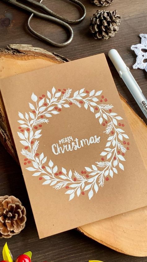 Simple DIY Christmas card with a hand-drawn wreath using a white gel pen for the leaves, red pen for berries and card base made out of a craft card stock. Pen Tutorial, Simple Wreath, Simple Christmas Cards, Wreath Drawing, Easy Christmas Wreaths, White Gel Pen, Christmas Drawing, Window Art, Learn How To Draw