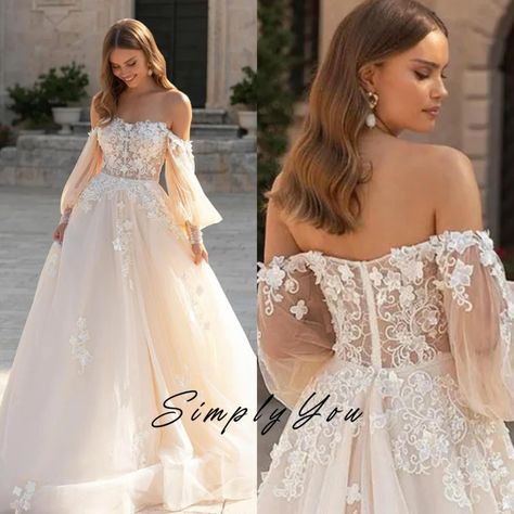 Exude elegance and grace on your special day with our Princess Wedding Dress. This enchanting gown features delicate lace appliques adorning the off-the-shoulder neckline and cascading down the bodice, creating a romantic and timeless look. The puff long sleeves add a touch of whimsy, while the custom-made design ensures a perfect fit. Say 'I do' in style with this exquisite bridal gown, crafted to make your wedding day dreams come true. ⭐ For Custom Size, please send a message. For Example: Siz Winter Wedding Dress Off The Shoulder, Whimsical Wedding Dress Sleeves, Boho Wedding Dress Puffy Sleeves, Cold Shoulder Wedding Dress Long Sleeve, Southern Wedding Dress With Sleeves, Fluffy Sleeve Wedding Dress, Billow Sleeves Wedding Dress, Off The Shoulder Wedding Dress Sleeves, Off The Shoulder Sleeve Wedding Dress