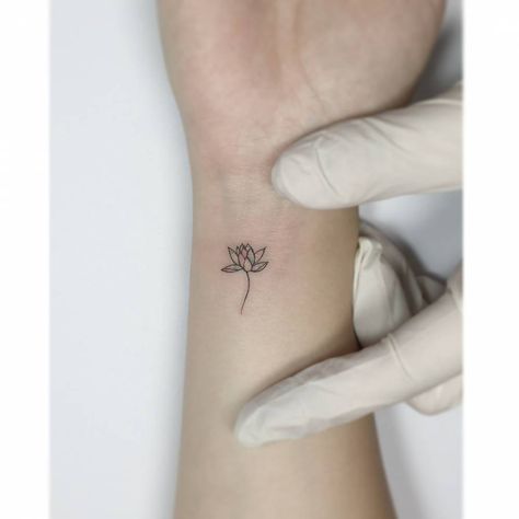 Lotus Tattoo Wrist, Lotus Flower Tattoo Wrist, Tiny Lotus Tattoo, Playground Tattoo, Small Lotus Tattoo, Lotus Flower Tattoos, Small Lotus Flower Tattoo, Small Rib Tattoos, Water Lily Tattoos