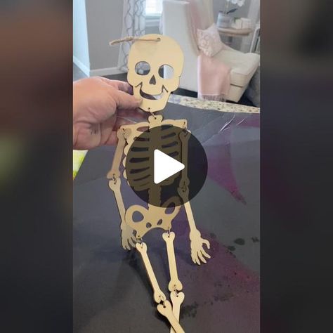 Dollar tree wooden skeleton used as template to paint on shirt. #dolla... | TikTok Dollar Tree Wooden Skeleton, Wood Skeleton Craft, Dollar Tree Skeleton Diy, Skeleton Diy Decoration, Dollar Tree Skeleton Crafts, Paint On Shirt, Skeleton Crafts, Painted Skeleton, Wooden Skeleton