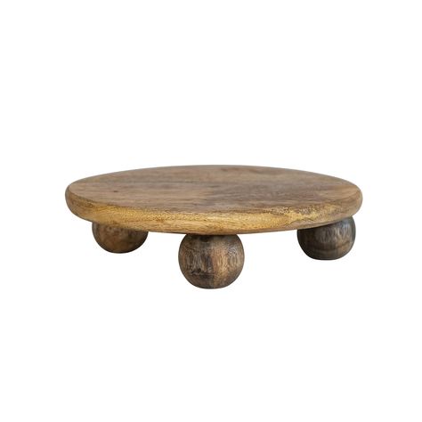 PRICES MAY VARY. This 9.75 inches round mango wood pedestal has a natural beauty and charming design adding a touch of rustic elegance to any table setting Its warm natural tones and unique grain patterns bring a sense of earthiness and warmth to any farmhouse, rustic, and bohemian space Use this versatile pedestal to display and serve any favorite desserts, appetizers, or even as a decorative centerpiece Made of mango wood This item has a size of 9.75 inches in length, 9.75 inches in width, and Plant Riser, Rustic Cake Stand, Dessert Stands, Wood Cake Stand, Cake Pedestal, Wood Cake, Rustic Cake, Wood Pedestal, Sideboard Console