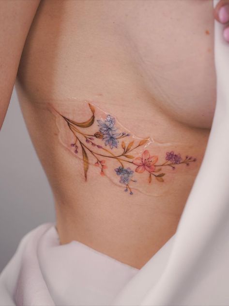 Beautiful floral tattoo design at EXP Haus tattoo studio London Lace Rose Tattoos, Women Tattoo For Men, Tattoo Rib, Flower Tattoo On Ribs, Men Flower Tattoo, Realistic Flower Tattoo, Underboob Tattoo Designs, Rib Tattoos For Women, Floral Thigh Tattoos