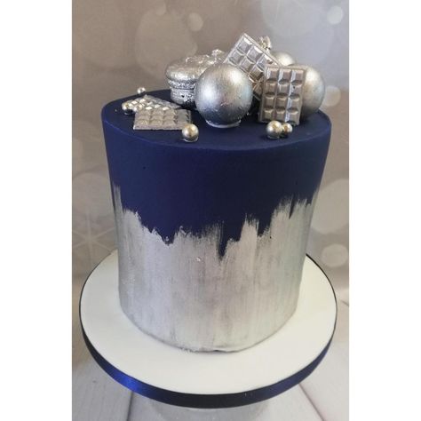 lovely silver and navy blue cake, with mini chocolate bars, macarons and silver balls Blue And Silver 2 Tier Cake, Blue And Silver Graduation Cake, Blue White Silver Cake, Navy Blue Ombre Cake, Navy And Silver Cake, Royal Blue And Silver Cake, Navy Blue And Silver Cake, Silver And Blue Cake, Blue And Silver Birthday Cake