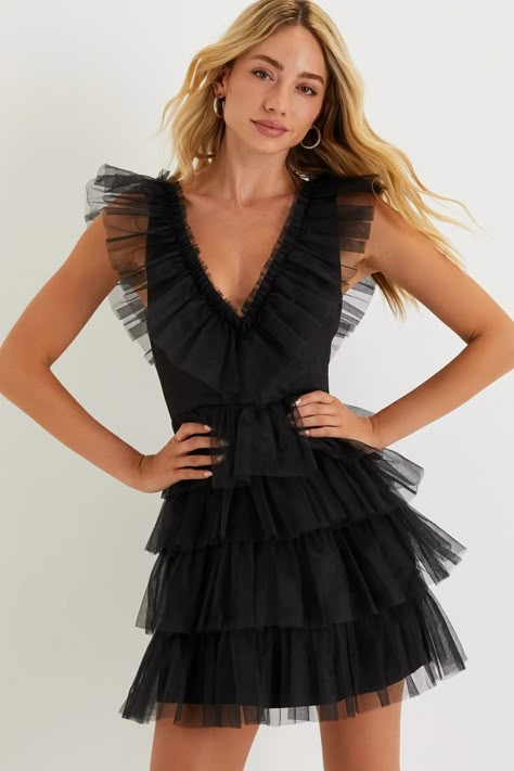 Everyone will be asking where you shop when you stroll into the party wearing the Lulus Striking Sensation Black Tulle Tiered Ruffled Mini Dress! Airy tulle overlays this iconic dress that has a sleeveless bodice with princess seams and a deep V-neckline (with a matching V-back). Skirt has a flirty tiered design with double layers of tulle, finishing at a mini hem. Hidden zipper/clasp at back. Cute Formal Dresses, Ruffled Mini Dress, Tulle Mini Dress, Cute Homecoming Dresses, Iconic Dresses, Adhesive Bra, Black Tulle, Grad Dresses, Princess Seams