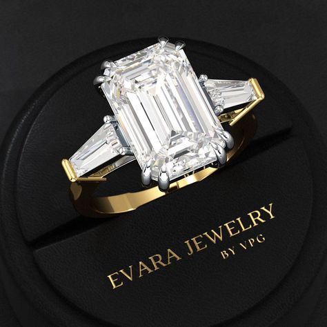 A ring that echoes eternal love—our 6 Carat Emerald Cut Diamond in a three-stone cathedral setting is the epitome of luxury. (Engagement ring, 6 carat ring, Emerald cut diamond ring, 3 stone ring, Cathedral setting ring, luxury ring, Emerald ring, Diamond ring, jewellery, jewelry trends) Radiant Cut Diamond Engagement Rings, Radiant Cut Diamond Ring, Luxury Wedding Rings, Cushion Cut Diamond Engagement Ring, Elongated Cushion Cut, Cushion Cut Diamond Ring, Emerald Cut Diamond Engagement Ring, Emerald Cut Diamond Engagement, Stacked Wedding Rings