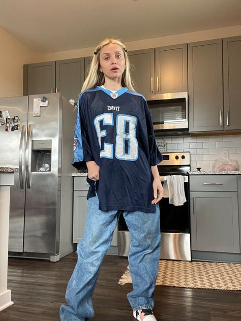 vintage oversized clothing vibes
trendy 
fashion
sports 
new york style
maximalism fashion Long Sleeve Jersey Outfit, Sports Shirt Outfit, Vintage Baggy Jeans, Smocking Fashion, Titans Jersey, Baseball Jersey Outfit, Long Sleeve Shirt Outfits, Vintage Tennessee, Baggy Shirts