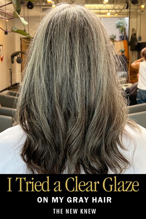 I tried a clear hair glaze on my gray hair and was blown away by the results. Check out all the deets plus my before and after pics to see if this is a good option for you too! Hair Glaze To Cover Gray, How To Make Grey Hair Look Good, Gray Hair Glossing, Blending Greys Into Blonde Hair, Growing Out Your Gray Hair, Highlights For Dark Brown Hair Going Grey, Glazed Hair Before And After, Temporary Color On Gray Hair, How To Make Gray Hair Shine