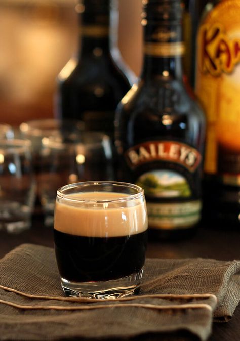 This Baby Guinness Cocktail is fun and deceiving; it's actually an after dinner drink made by layering Bailey's Irish Cream and Kahlua! Baby Guinness, Irish Coffee Cake, Guinness Cocktail, St Patricks Day Drinks, Colorado Food, Irish Dishes, After Dinner Drinks, Liquor Drinks, Baileys Irish